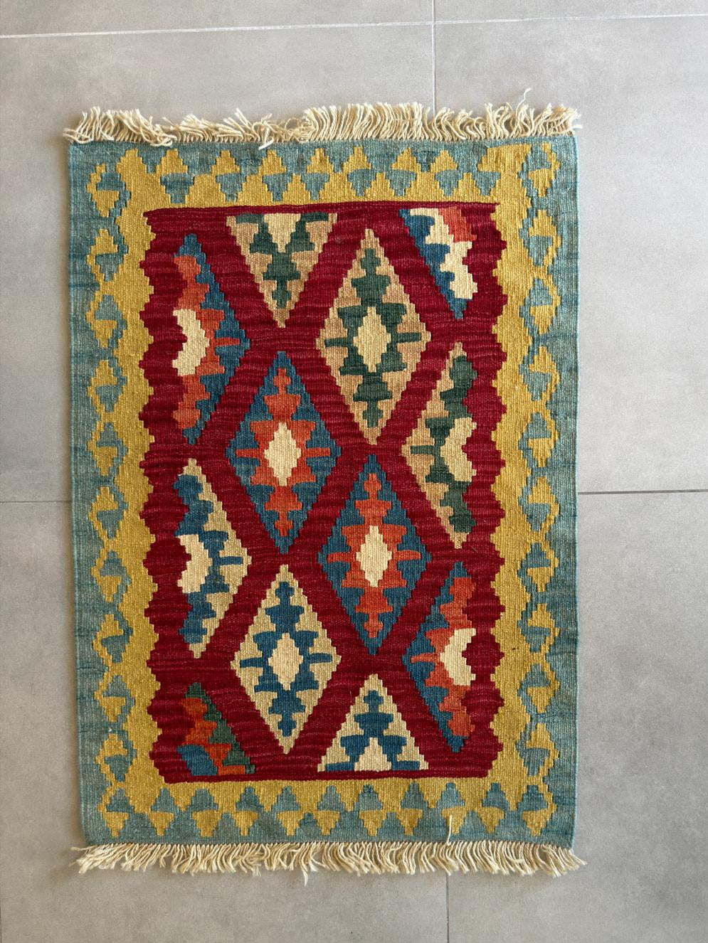 Multicolored geometric patterned rug 