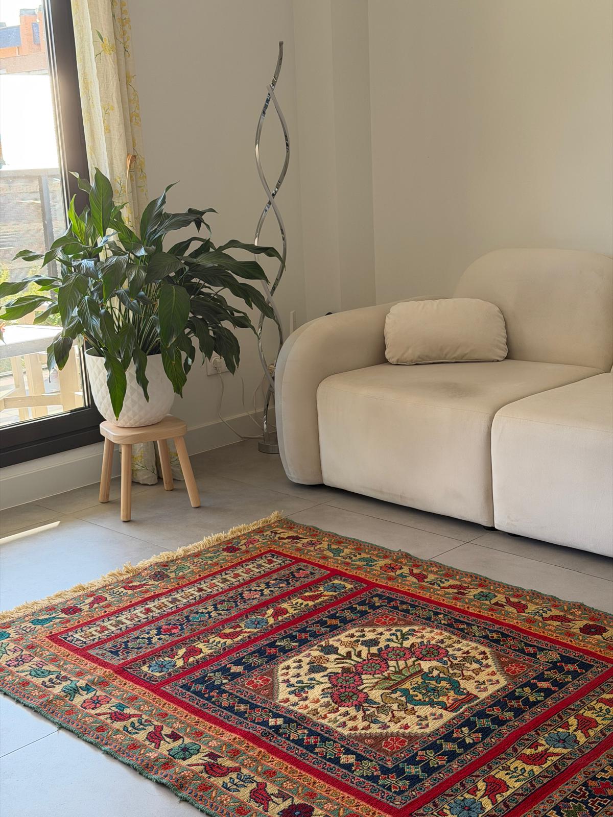 Decorative rug with geometric pattern in a living room setting
